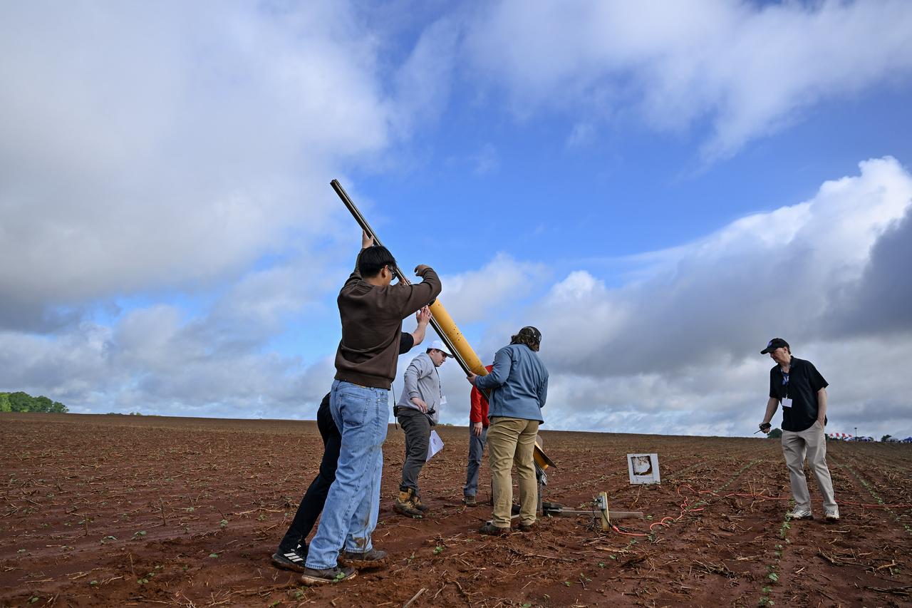 Over than 980 middle school, high school, and college students from across the nation launched more than 40 high-powered rockets just north of NASA’s Marshall Space Flight Center in Huntsville, Alabama. This year marked the 25th anniversary of the competition. To compete, students follow the NASA engineering design lifecycle by going through a series of reviews for nine months leading up to launch day.   Each year, a payload challenge is issued to the university teams, and this year’s task took inspiration from the agency’s Artemis missions, where NASA will send astronauts to explore the Moon for scientific discovery, economic benefit, and to build the foundation for the first crewed missions to Mars. Teams were challenged to include “reports” from STEMnauts, non-living objects representing astronauts. The STEMnaut “crew” had to relay real-time data to the student team’s mission control, just as the Artemis astronaut crew will do as they explore the lunar surface.    To learn more, visit: www.nasa.gov/studentlaunch.  