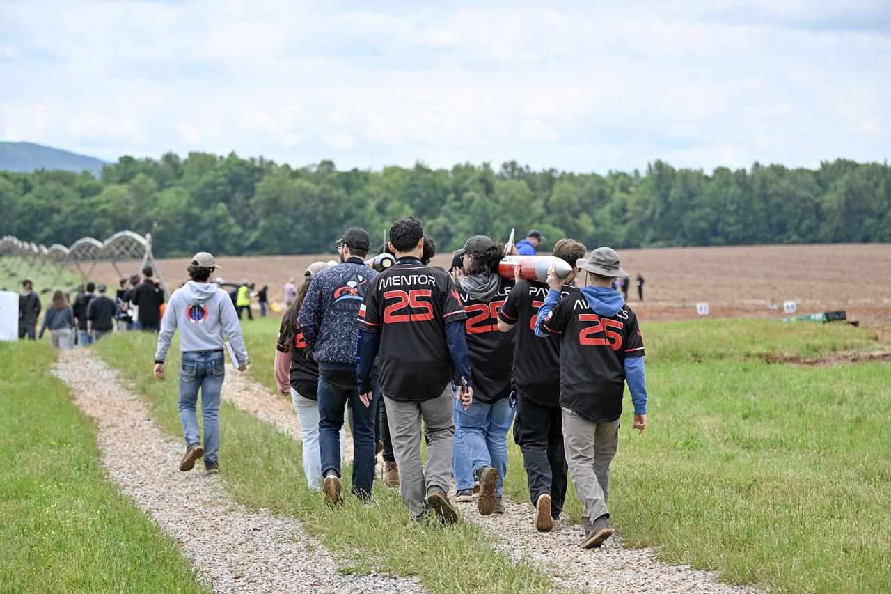 Over than 980 middle school, high school, and college students from across the nation launched more than 40 high-powered rockets just north of NASA’s Marshall Space Flight Center in Huntsville, Alabama. This year marked the 25th anniversary of the competition. To compete, students follow the NASA engineering design lifecycle by going through a series of reviews for nine months leading up to launch day.   Each year, a payload challenge is issued to the university teams, and this year’s task took inspiration from the agency’s Artemis missions, where NASA will send astronauts to explore the Moon for scientific discovery, economic benefit, and to build the foundation for the first crewed missions to Mars. Teams were challenged to include “reports” from STEMnauts, non-living objects representing astronauts. The STEMnaut “crew” had to relay real-time data to the student team’s mission control, just as the Artemis astronaut crew will do as they explore the lunar surface.    To learn more, visit: www.nasa.gov/studentlaunch.  