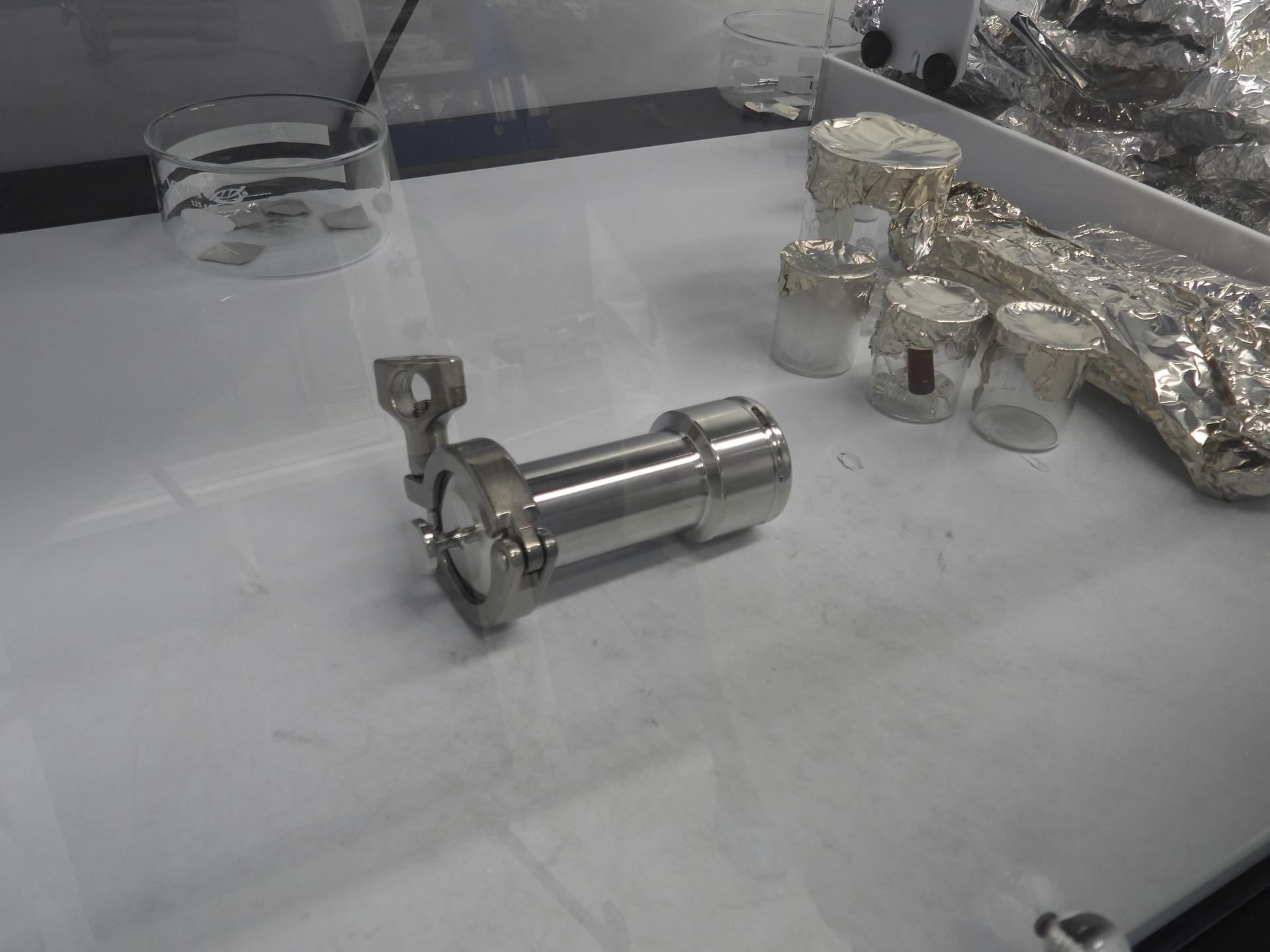 Photographed inside a laboratory at NASA's Goddard Space Flight Center in Greenbelt, Maryland, this cannister contains a portion of the asteroid Bennu sample delivered to Earth by the agency's OSIRIS-REx (Origins, Spectral Interpretation, Resource Identification, and Security – Regolith Explorer) mission.