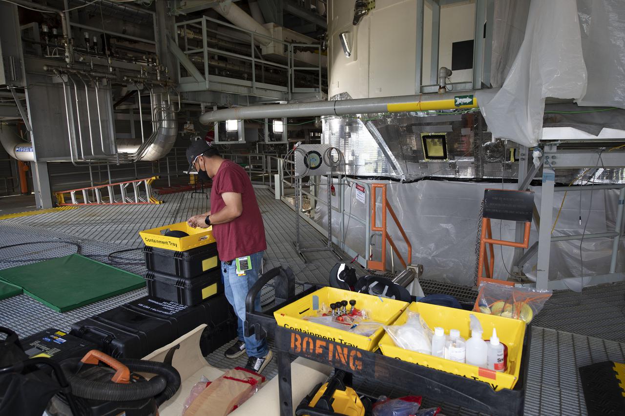 Team members at NASA’s Stennis Space Center near Bay St. Louis, Mississippi, complete refurbishment work on the first core stage of the agency’s Space Launch System (SLS) rocket. The work followed a successful hot fire of the stage and its four RS-25 engines March 18. The hot fire marked the culmination of a yearlong Green Run series of tests of the stage and its integrated systems. Following refurbishment work, the core stage will be removed from the test stand and transported to Kennedy Space Center in Florida, aboard NASA’s Pegasus barge, shown delivering equipment to the B-2 Test Stand. At Kennedy, the core stage will be integrated with the rest of SLS rocket and prepared for the launch of the Artemis I mission to the Moon.  Photo Credit: NASA
