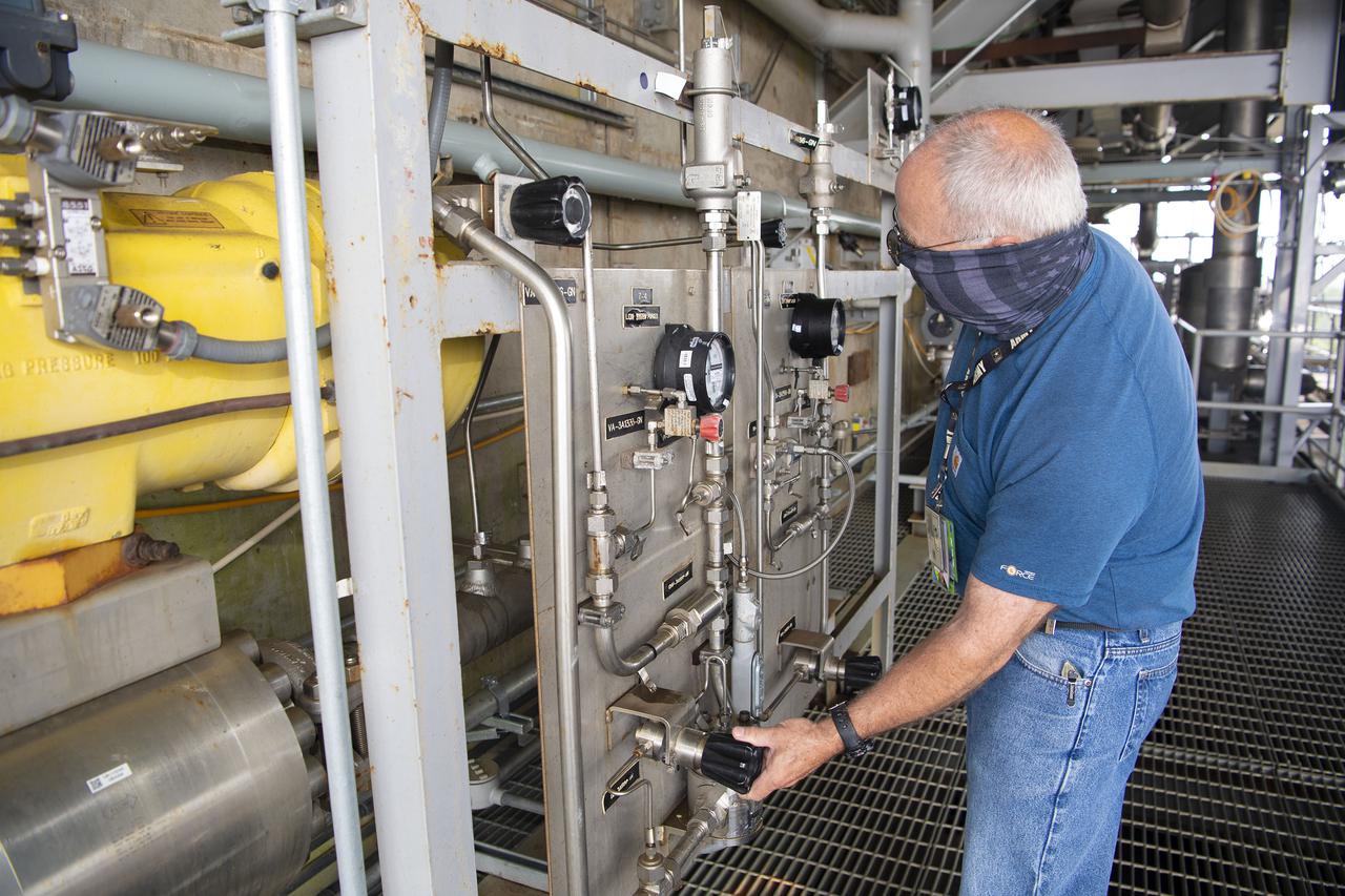 Team members at NASA’s Stennis Space Center near Bay St. Louis, Mississippi, complete refurbishment work on the first core stage of the agency’s Space Launch System (SLS) rocket. The work followed a successful hot fire of the stage and its four RS-25 engines March 18. The hot fire marked the culmination of a yearlong Green Run series of tests of the stage and its integrated systems. Following refurbishment work, the core stage will be removed from the test stand and transported to Kennedy Space Center in Florida, aboard NASA’s Pegasus barge, shown delivering equipment to the B-2 Test Stand. At Kennedy, the core stage will be integrated with the rest of SLS rocket and prepared for the launch of the Artemis I mission to the Moon.  Photo Credit: NASA