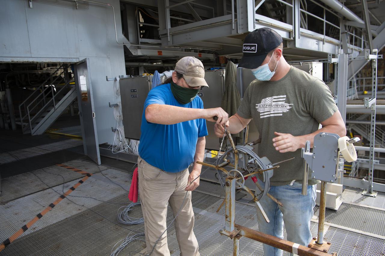 Team members at NASA’s Stennis Space Center near Bay St. Louis, Mississippi, complete refurbishment work on the first core stage of the agency’s Space Launch System (SLS) rocket. The work followed a successful hot fire of the stage and its four RS-25 engines March 18. The hot fire marked the culmination of a yearlong Green Run series of tests of the stage and its integrated systems. Following refurbishment work, the core stage will be removed from the test stand and transported to Kennedy Space Center in Florida, aboard NASA’s Pegasus barge, shown delivering equipment to the B-2 Test Stand. At Kennedy, the core stage will be integrated with the rest of SLS rocket and prepared for the launch of the Artemis I mission to the Moon.  Photo Credit: NASA