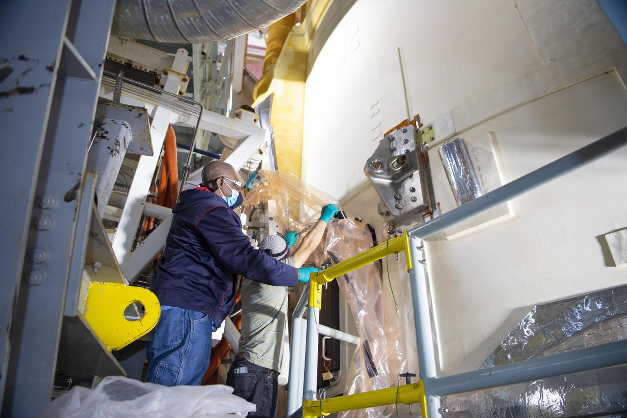 Team members at NASA’s Stennis Space Center near Bay St. Louis, Mississippi, complete refurbishment work on the first core stage of the agency’s Space Launch System (SLS) rocket. The work followed a successful hot fire of the stage and its four RS-25 engines March 18. The hot fire marked the culmination of a yearlong Green Run series of tests of the stage and its integrated systems. Following refurbishment work, the core stage will be removed from the test stand and transported to Kennedy Space Center in Florida, aboard NASA’s Pegasus barge, shown delivering equipment to the B-2 Test Stand. At Kennedy, the core stage will be integrated with the rest of SLS rocket and prepared for the launch of the Artemis I mission to the Moon.  Photo Credit: NASA