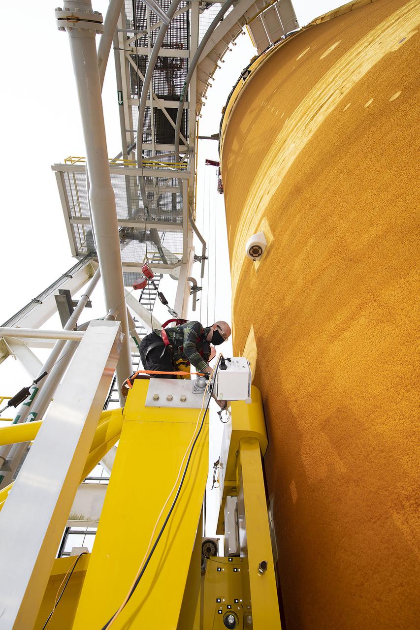 Team members at NASA’s Stennis Space Center near Bay St. Louis, Mississippi, complete refurbishment work on the first core stage of the agency’s Space Launch System (SLS) rocket. The work followed a successful hot fire of the stage and its four RS-25 engines March 18. The hot fire marked the culmination of a yearlong Green Run series of tests of the stage and its integrated systems. Following refurbishment work, the core stage will be removed from the test stand and transported to Kennedy Space Center in Florida, aboard NASA’s Pegasus barge, shown delivering equipment to the B-2 Test Stand. At Kennedy, the core stage will be integrated with the rest of SLS rocket and prepared for the launch of the Artemis I mission to the Moon.  Photo Credit: NASA