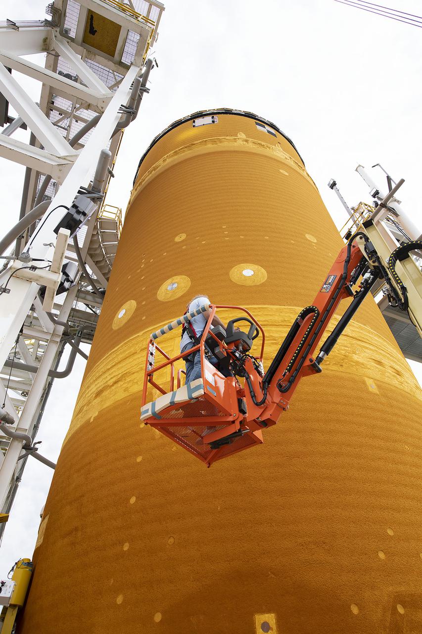 Team members at NASA’s Stennis Space Center near Bay St. Louis, Mississippi, complete refurbishment work on the first core stage of the agency’s Space Launch System (SLS) rocket. The work followed a successful hot fire of the stage and its four RS-25 engines March 18. The hot fire marked the culmination of a yearlong Green Run series of tests of the stage and its integrated systems. Following refurbishment work, the core stage will be removed from the test stand and transported to Kennedy Space Center in Florida, aboard NASA’s Pegasus barge, shown delivering equipment to the B-2 Test Stand. At Kennedy, the core stage will be integrated with the rest of SLS rocket and prepared for the launch of the Artemis I mission to the Moon.  Photo Credit: NASA
