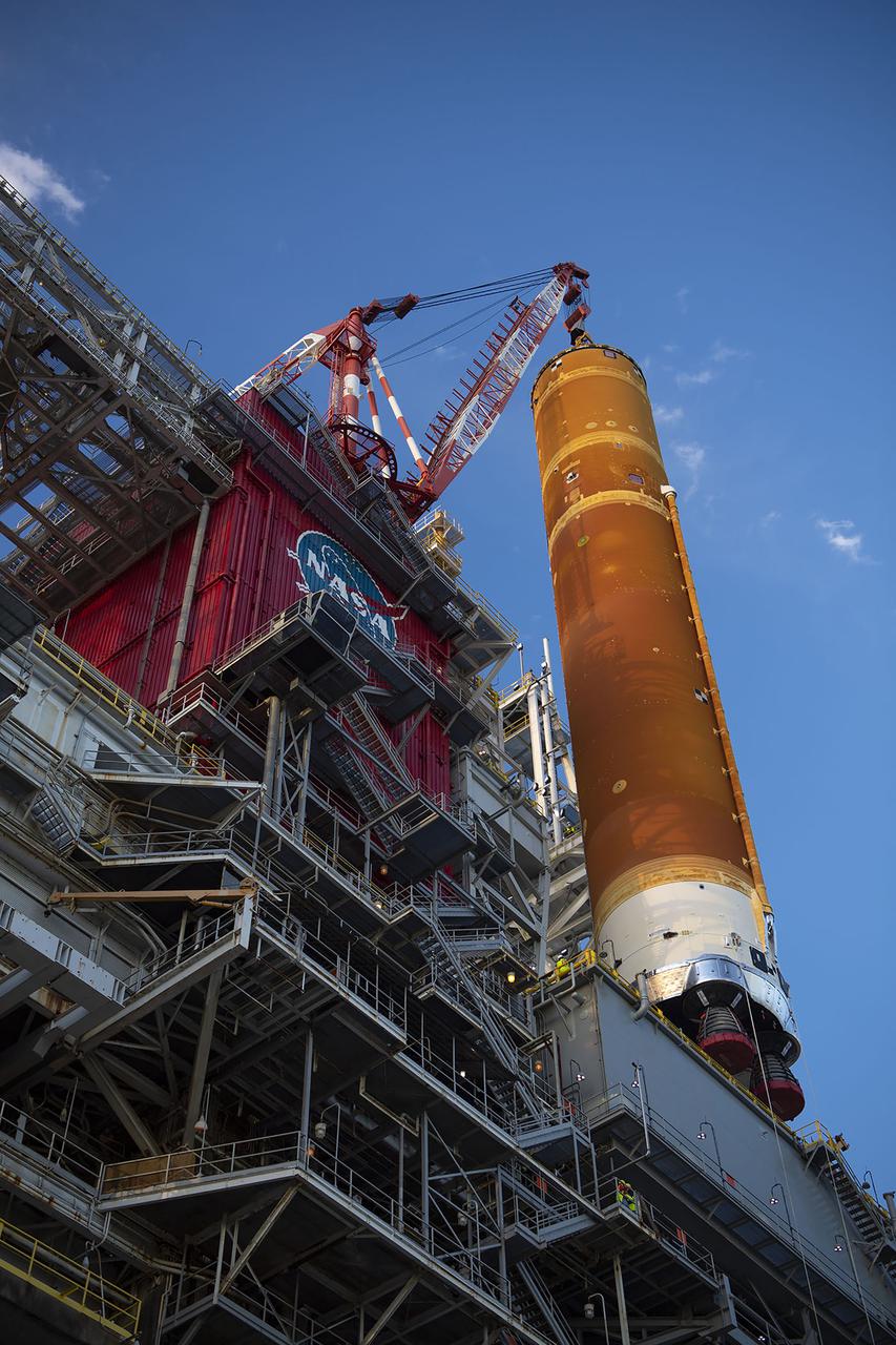 Following a successful Green Run hot fire at NASA’s Stennis Space Center near Bay St. Louis, Mississippi, on March 18, members of a blended team work April 19-20 to remove the first core stage of the agency’s Space Launch System (SLS) rocket from the B-2 Test Stand. The work required crews to lift the core stage from its vertical placement in the stand and lower it to a horizontal position on the B-2 Test Stand tarmac. The stage now will be loaded on NASA’s Pegasus barge for transport to Kennedy, where it will be prepared for launch of the Artemis I mission. Removal of the largest rocket stage ever built by NASA followed completion of a series of eight Green Run tests over the past year. During the Green Run series, teams performed a comprehensive test of the stand’s sophisticated and integrated systems. Photo Credit: NASA