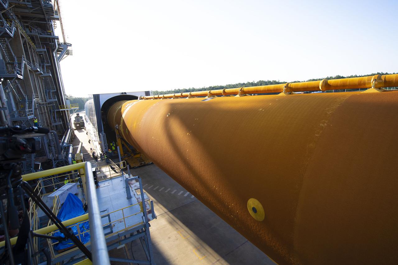 Team members at NASA’s Stennis Space Center near Bay St. Louis, Mississippi, load the first core stage of the agency’s Space Launch System (SLS) rocket on to the agency’s Pegasus barge in preparation for its transport to Kennedy Space Center in Florida. The loading activity followed removal of the stage from the B-2 Test Stand at Stennis on April 19-20, 2021. It comes about a month after NASA conducted a successful hot fire of the stage and its four RS-25 engines on March 18 and after teams completed various refurbishment activities. Once at Kennedy, the will be integrated with the rest of SLS rocket and prepared for the launch of the Artemis I mission to the Moon. Photo Credit: NASA