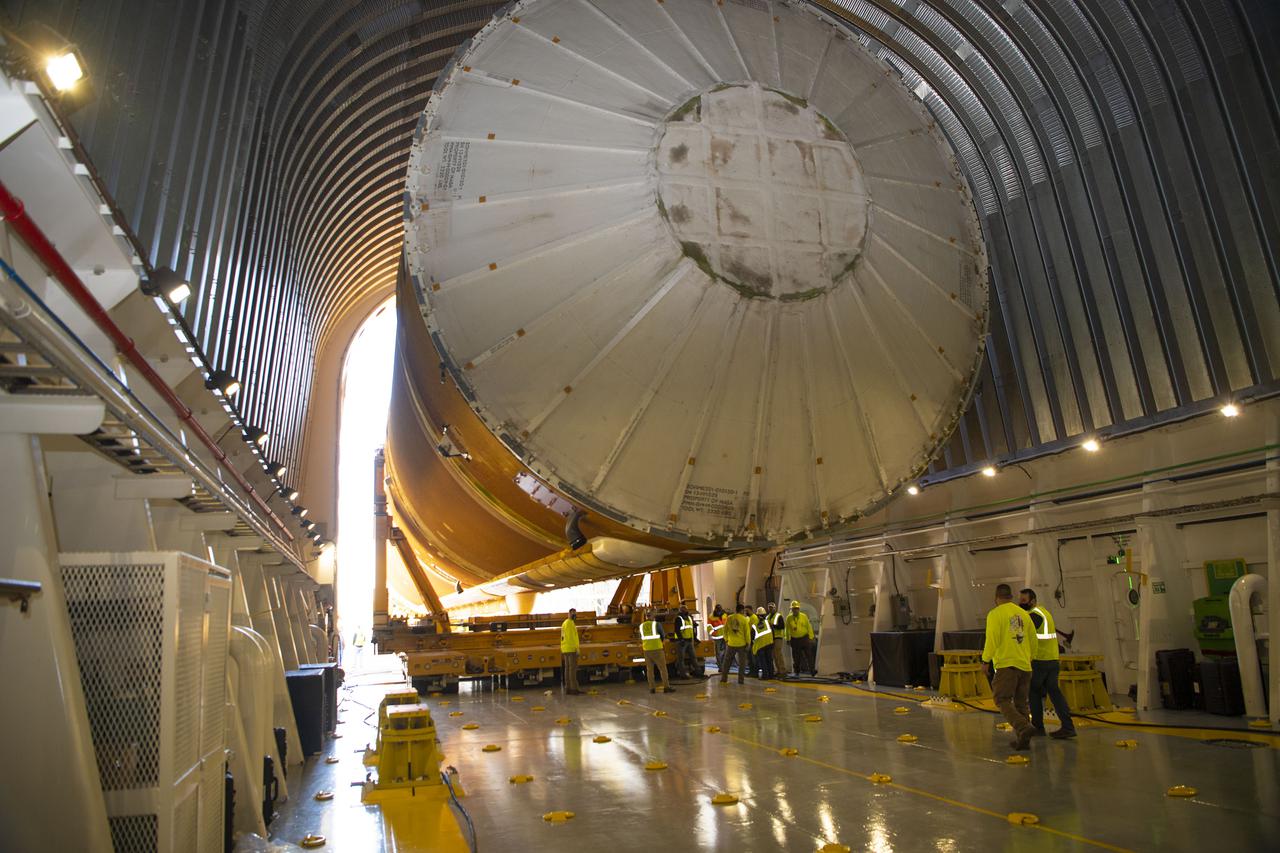 Team members at NASA’s Stennis Space Center near Bay St. Louis, Mississippi, load the first core stage of the agency’s Space Launch System (SLS) rocket on to the agency’s Pegasus barge in preparation for its transport to Kennedy Space Center in Florida. The loading activity followed removal of the stage from the B-2 Test Stand at Stennis on April 19-20, 2021. It comes about a month after NASA conducted a successful hot fire of the stage and its four RS-25 engines on March 18 and after teams completed various refurbishment activities. Once at Kennedy, the will be integrated with the rest of SLS rocket and prepared for the launch of the Artemis I mission to the Moon. Photo Credit: NASA