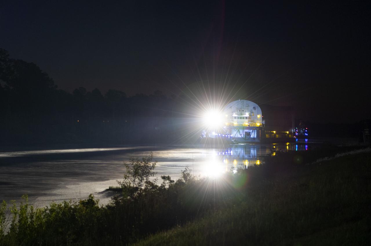 The first core stage of NASA’s Space Launch System (SLS) rocket, loaded onto the agency’s Pegasus barge, departs Stennis Space Center near Bay St. Louis, Mississippi, headed to Kennedy Space Center in Florida. The departure of the core stage in mid-April 2021 followed completion of a Green Run test series of the stage systems in preparation for its launch on the Artemis I mission. The Green Run series concluded with a March 18 hot fire of the stage’s four RS-25 engines on the B-2 Test Stand at Stennis, just as during an actual launch. Following refurbishment work, the stage was removed from the B-2 stand and loaded onto the Pegasus barge for transport. Once at Kennedy, the will be integrated with the rest of SLS rocket and prepared for the launch of the Artemis I mission to the Moon. Photo Credit: NASA