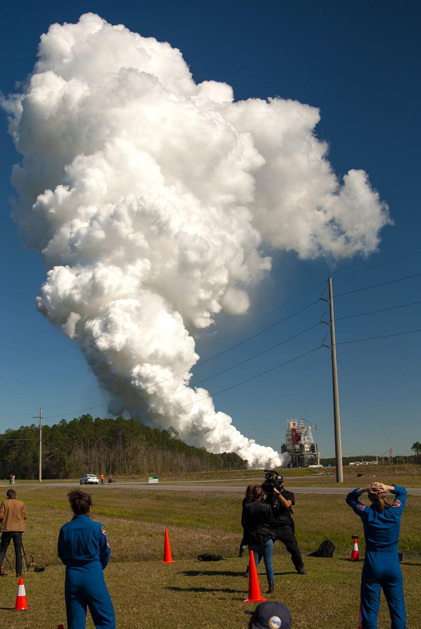 NASA conducts a hot fire test March 18, 2021, of the core stage for the agency’s Space Launch System rocket on the B-2 Test Stand at Stennis Space Center near Bay St. Louis, Mississippi. The hot fire test of the stage’s four RS-25 engines generated a combined 1.6 million pounds of thrust, just as will occur during an actual launch. The hot fire is the final test of the Green Run test series, which represents a comprehensive assessment of the core stage and its integrated systems prior to its launch on the Artemis I mission to the Moon.