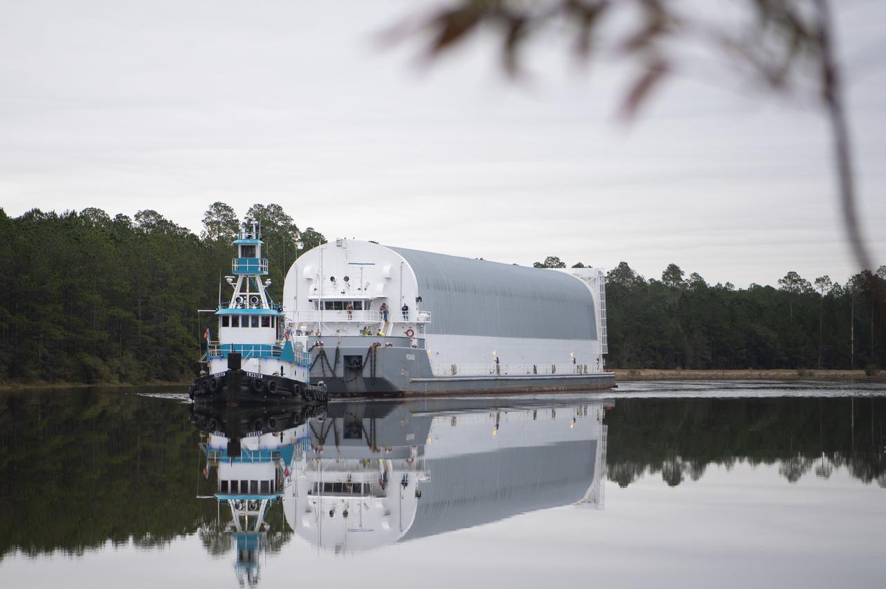 The first flight core stage for NASA’s new Space Launch System rocket arrived at Stennis Space Center on Jan. 12 for a series of tests prior to its maiden Artemis I flight. The core stage was transported from Michoud Assembly Facility in New Orleans to the B-2 Test Stand dock at Stennis aboard NASA’s Pegasus barge. Soon after arrival, the stage was rolled off of Pegasus onto the B-2 Test Stand tarmac. After the stage is lifted and installed on the B-2 stand, it will undergo a series of “Green Run” systems test that represent the first integrated testing of its sophisticated systems.