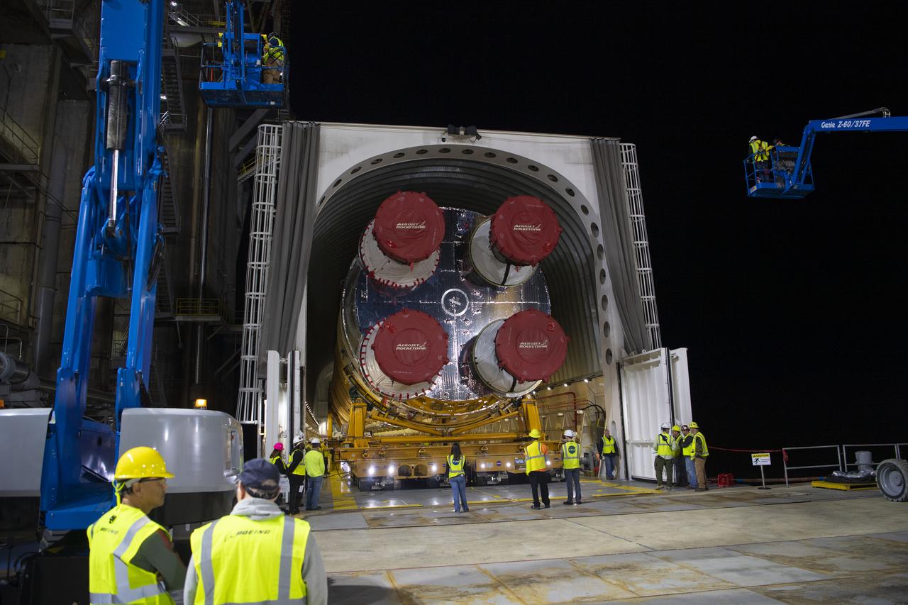 The first flight core stage for NASA’s new Space Launch System rocket arrived at Stennis Space Center on Jan. 12 for a series of tests prior to its maiden Artemis I flight. The core stage was transported from Michoud Assembly Facility in New Orleans to the B-2 Test Stand dock at Stennis aboard NASA’s Pegasus barge. Soon after arrival, the stage was rolled off of Pegasus onto the B-2 Test Stand tarmac. After the stage is lifted and installed on the B-2 stand, it will undergo a series of “Green Run” systems test that represent the first integrated testing of its sophisticated systems.
