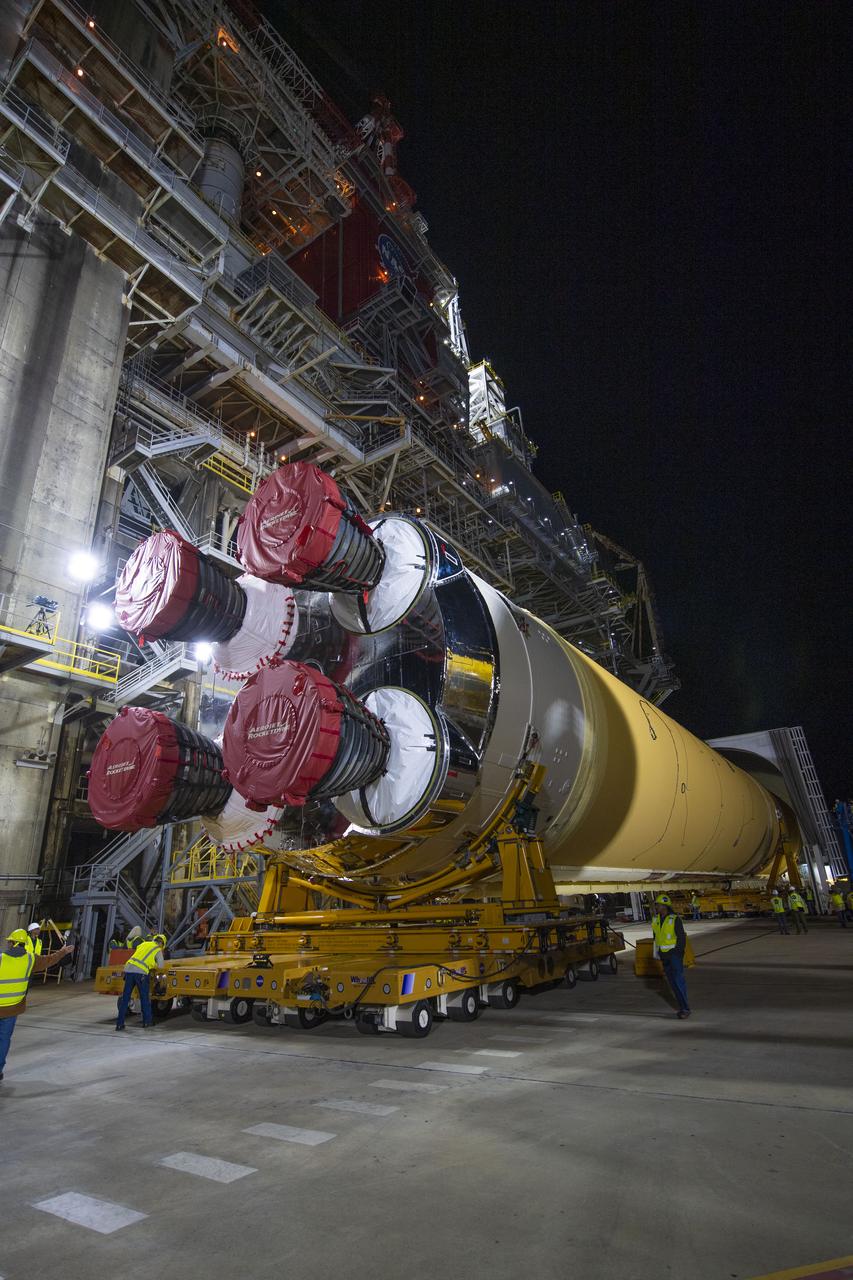 The first flight core stage for NASA’s new Space Launch System rocket arrived at Stennis Space Center on Jan. 12 for a series of tests prior to its maiden Artemis I flight. The core stage was transported from Michoud Assembly Facility in New Orleans to the B-2 Test Stand dock at Stennis aboard NASA’s Pegasus barge. Soon after arrival, the stage was rolled off of Pegasus onto the B-2 Test Stand tarmac. After the stage is lifted and installed on the B-2 stand, it will undergo a series of “Green Run” systems test that represent the first integrated testing of its sophisticated systems.