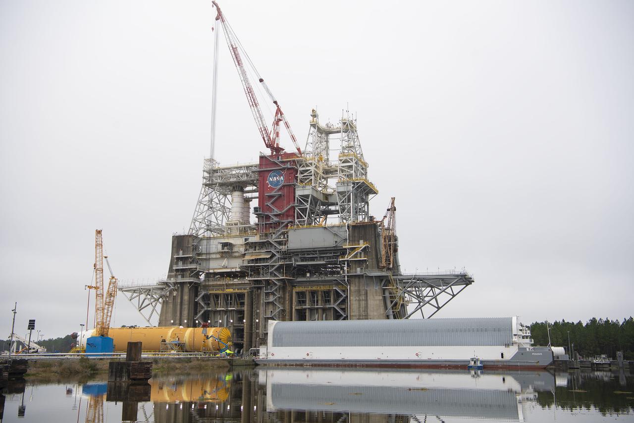 On Jan. 21-22, 2020, crews at Stennis Space Center lifted and installed the first core stage of NASA’s new Space Launch System (SLS) rocket onto the B-2 Test Stand. In upcoming months, a top-to-bottom, integrated series of Green Run tests will be conducted on the stage and its sophisticated systems. Following testing, the stage will be used to help launch the maiden Artemis I test mission of SLS and the Orion spacecraft. Through the Artemis program, NASA will send humans, including the first woman and next man, to the Moon to establish a sustainable presence.