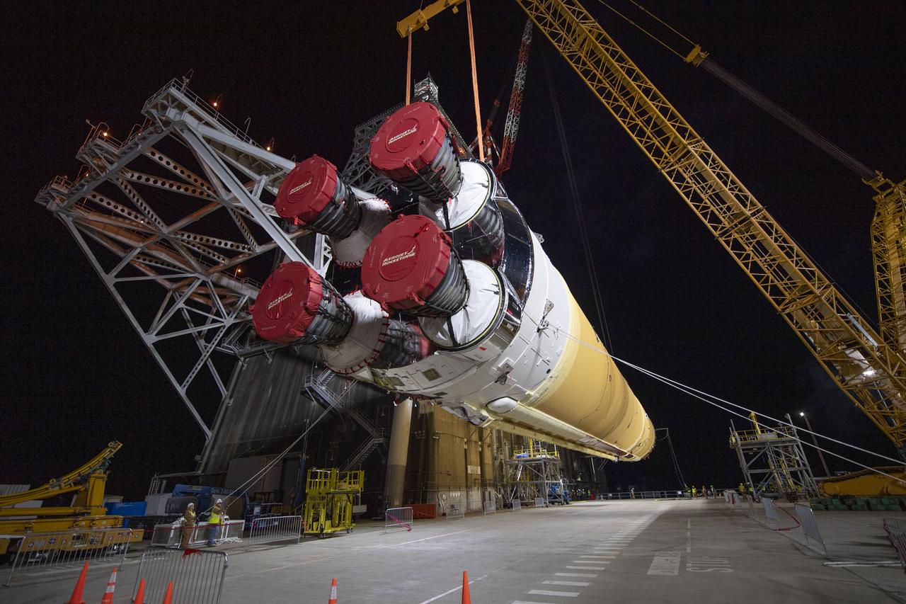 On Jan. 21-22, 2020, crews at Stennis Space Center lifted and installed the first core stage of NASA’s new Space Launch System (SLS) rocket onto the B-2 Test Stand. In upcoming months, a top-to-bottom, integrated series of Green Run tests will be conducted on the stage and its sophisticated systems. Following testing, the stage will be used to help launch the maiden Artemis I test mission of SLS and the Orion spacecraft. Through the Artemis program, NASA will send humans, including the first woman and next man, to the Moon to establish a sustainable presence.