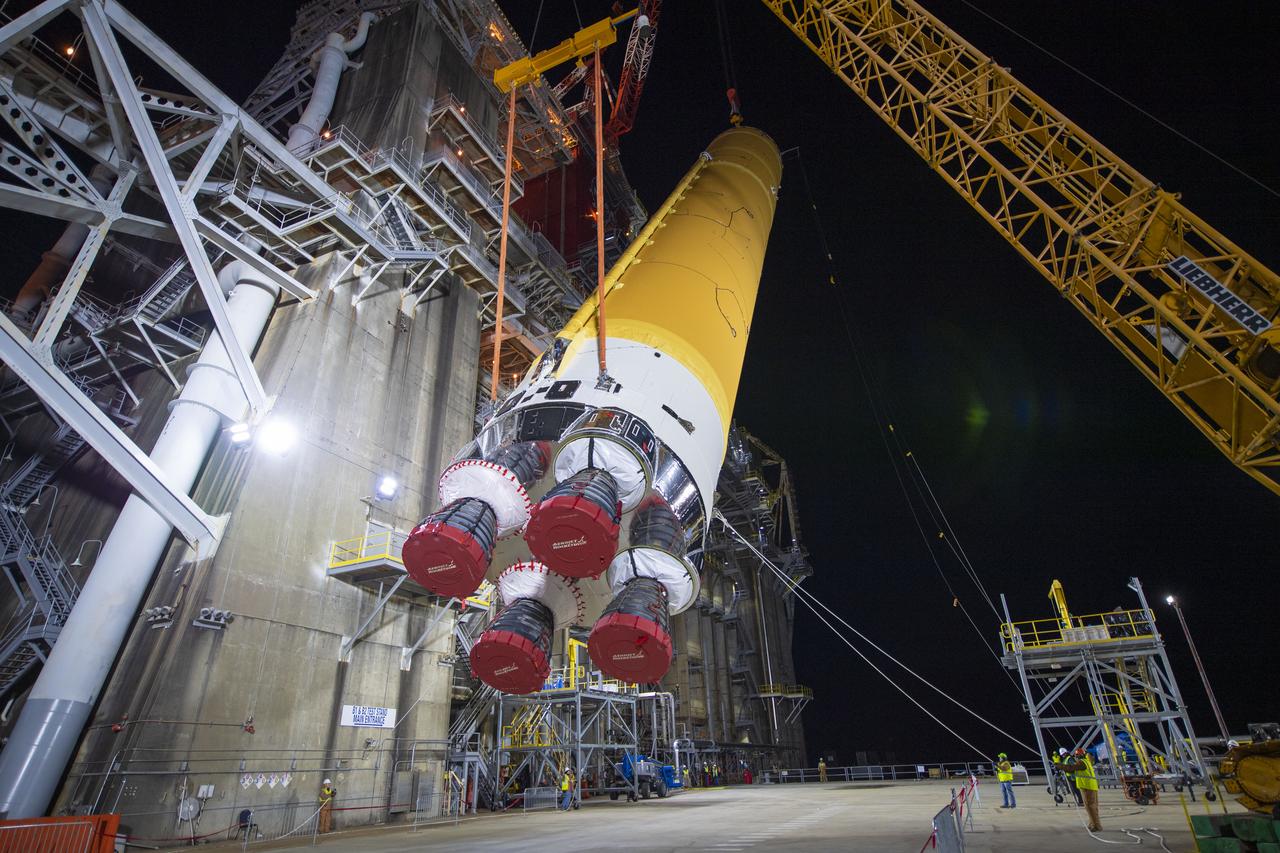 On Jan. 21-22, 2020, crews at Stennis Space Center lifted and installed the first core stage of NASA’s new Space Launch System (SLS) rocket onto the B-2 Test Stand. In upcoming months, a top-to-bottom, integrated series of Green Run tests will be conducted on the stage and its sophisticated systems. Following testing, the stage will be used to help launch the maiden Artemis I test mission of SLS and the Orion spacecraft. Through the Artemis program, NASA will send humans, including the first woman and next man, to the Moon to establish a sustainable presence.