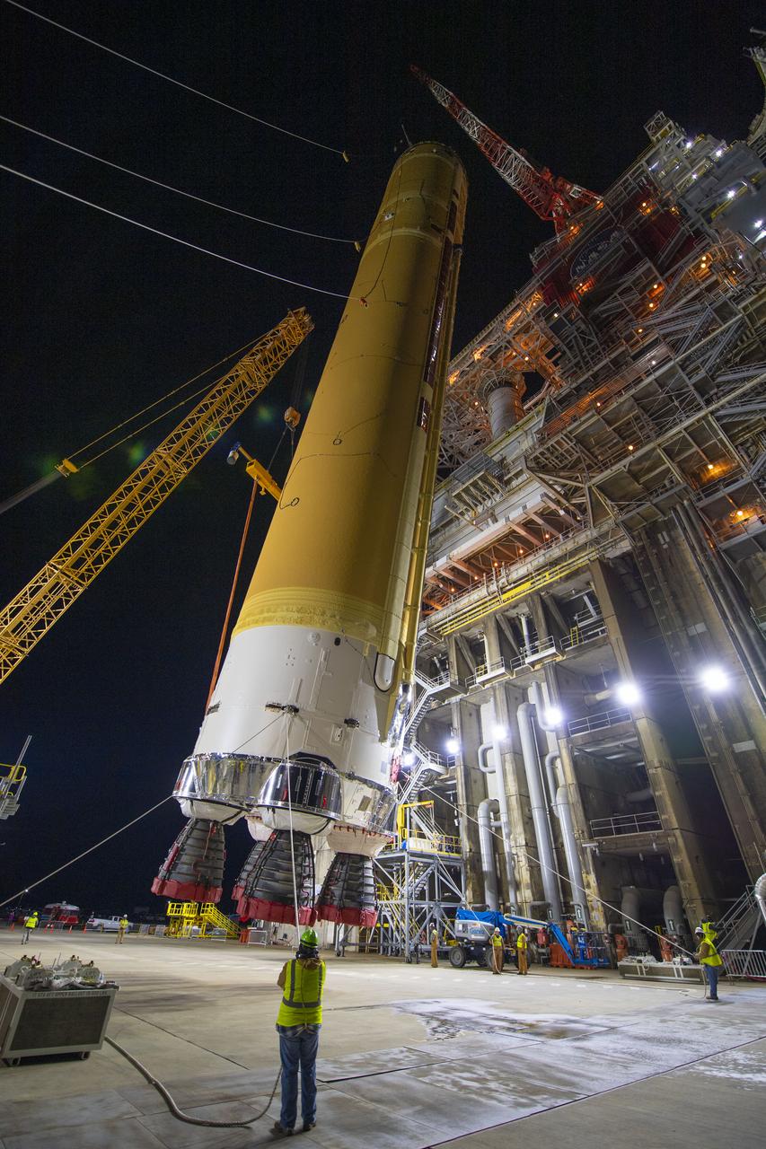 On Jan. 21-22, 2020, crews at Stennis Space Center lifted and installed the first core stage of NASA’s new Space Launch System (SLS) rocket onto the B-2 Test Stand. In upcoming months, a top-to-bottom, integrated series of Green Run tests will be conducted on the stage and its sophisticated systems. Following testing, the stage will be used to help launch the maiden Artemis I test mission of SLS and the Orion spacecraft. Through the Artemis program, NASA will send humans, including the first woman and next man, to the Moon to establish a sustainable presence.