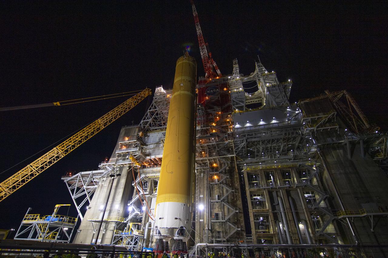 On Jan. 21-22, 2020, crews at Stennis Space Center lifted and installed the first core stage of NASA’s new Space Launch System (SLS) rocket onto the B-2 Test Stand. In upcoming months, a top-to-bottom, integrated series of Green Run tests will be conducted on the stage and its sophisticated systems. Following testing, the stage will be used to help launch the maiden Artemis I test mission of SLS and the Orion spacecraft. Through the Artemis program, NASA will send humans, including the first woman and next man, to the Moon to establish a sustainable presence.