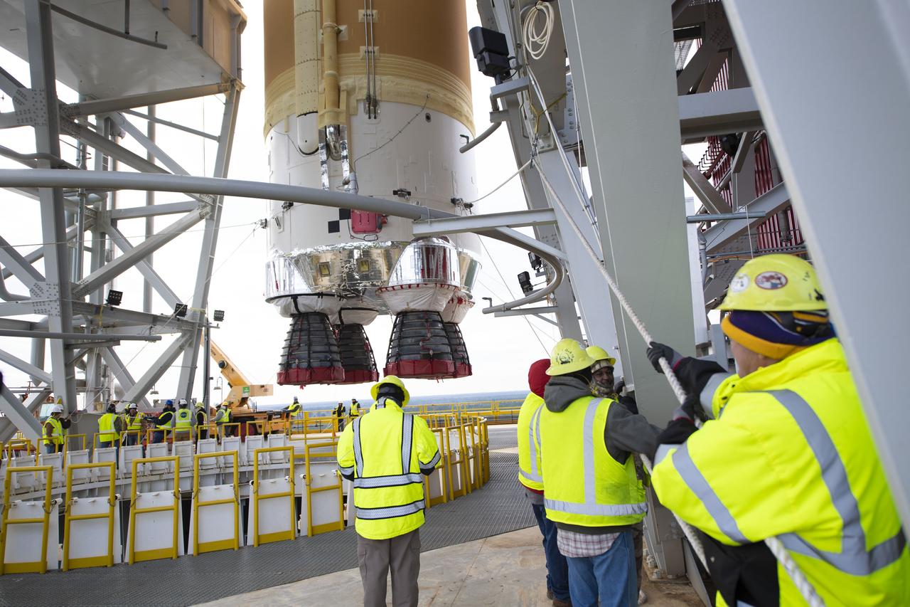 On Jan. 21-22, 2020, crews at Stennis Space Center lifted and installed the first core stage of NASA’s new Space Launch System (SLS) rocket onto the B-2 Test Stand. In upcoming months, a top-to-bottom, integrated series of Green Run tests will be conducted on the stage and its sophisticated systems. Following testing, the stage will be used to help launch the maiden Artemis I test mission of SLS and the Orion spacecraft. Through the Artemis program, NASA will send humans, including the first woman and next man, to the Moon to establish a sustainable presence.