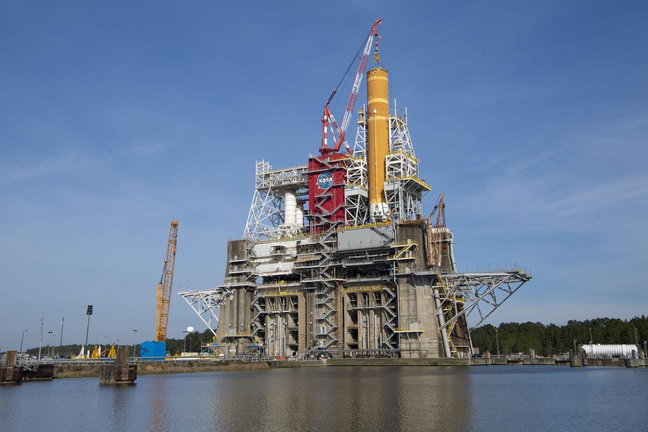 On Jan. 21-22, 2020, crews at Stennis Space Center lifted and installed the first core stage of NASA’s new Space Launch System (SLS) rocket onto the B-2 Test Stand. In upcoming months, a top-to-bottom, integrated series of Green Run tests will be conducted on the stage and its sophisticated systems. Following testing, the stage will be used to help launch the maiden Artemis I test mission of SLS and the Orion spacecraft. Through the Artemis program, NASA will send humans, including the first woman and next man, to the Moon to establish a sustainable presence.