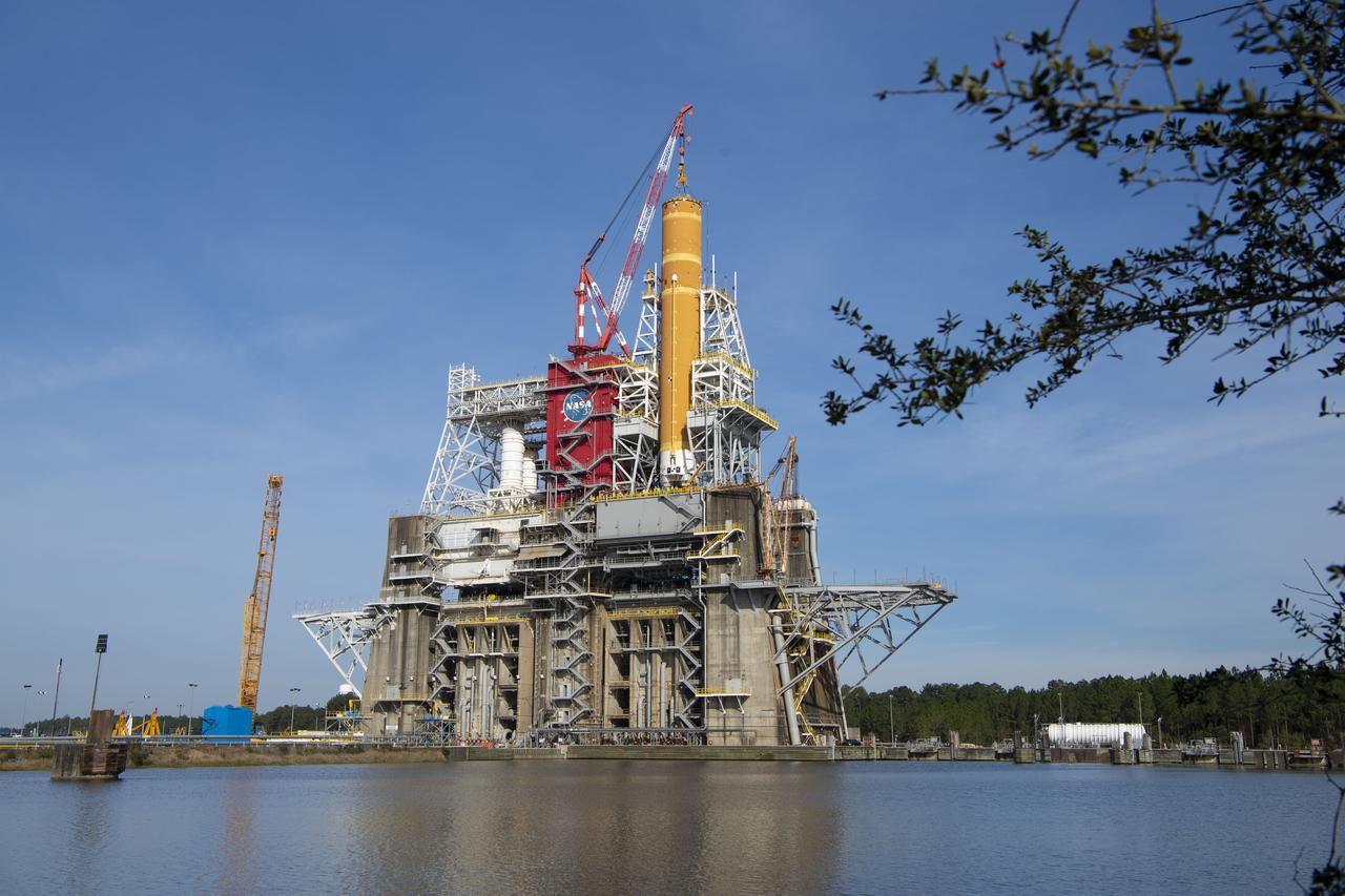On Jan. 21-22, 2020, crews at Stennis Space Center lifted and installed the first core stage of NASA’s new Space Launch System (SLS) rocket onto the B-2 Test Stand. In upcoming months, a top-to-bottom, integrated series of Green Run tests will be conducted on the stage and its sophisticated systems. Following testing, the stage will be used to help launch the maiden Artemis I test mission of SLS and the Orion spacecraft. Through the Artemis program, NASA will send humans, including the first woman and next man, to the Moon to establish a sustainable presence.