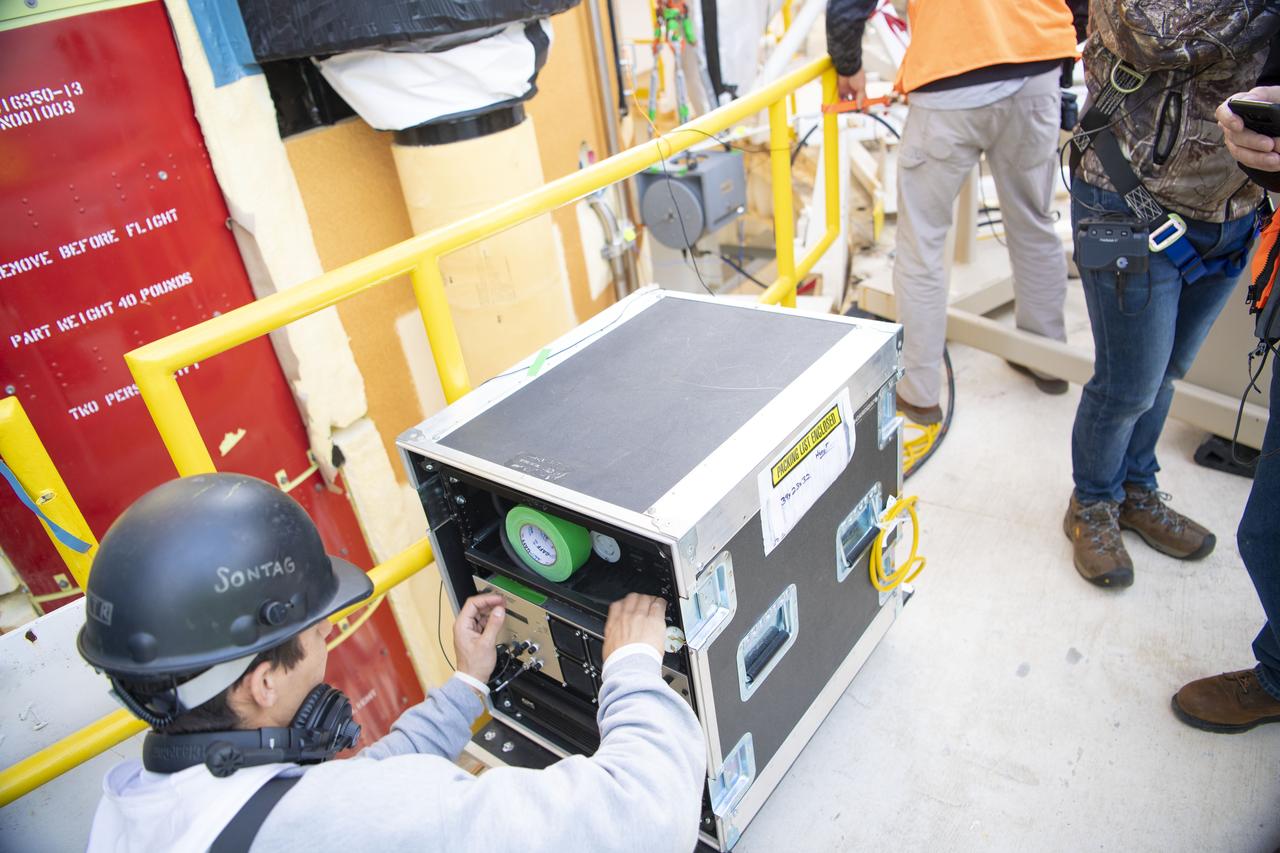 On Jan. 30, 2020, crews at Stennis Space Center successfully conducted modal testing of the first core stage of NASA’s new  Space Launch System (SLS) rocket. Data from the modal test will be used to verify structural vibration modes and verify flight control parameters.  The test is part of a Green Run series of testing that represents the first top-to-bottom integrated testing of the stage’s systems  prior to its maiden Artemis I test mission.