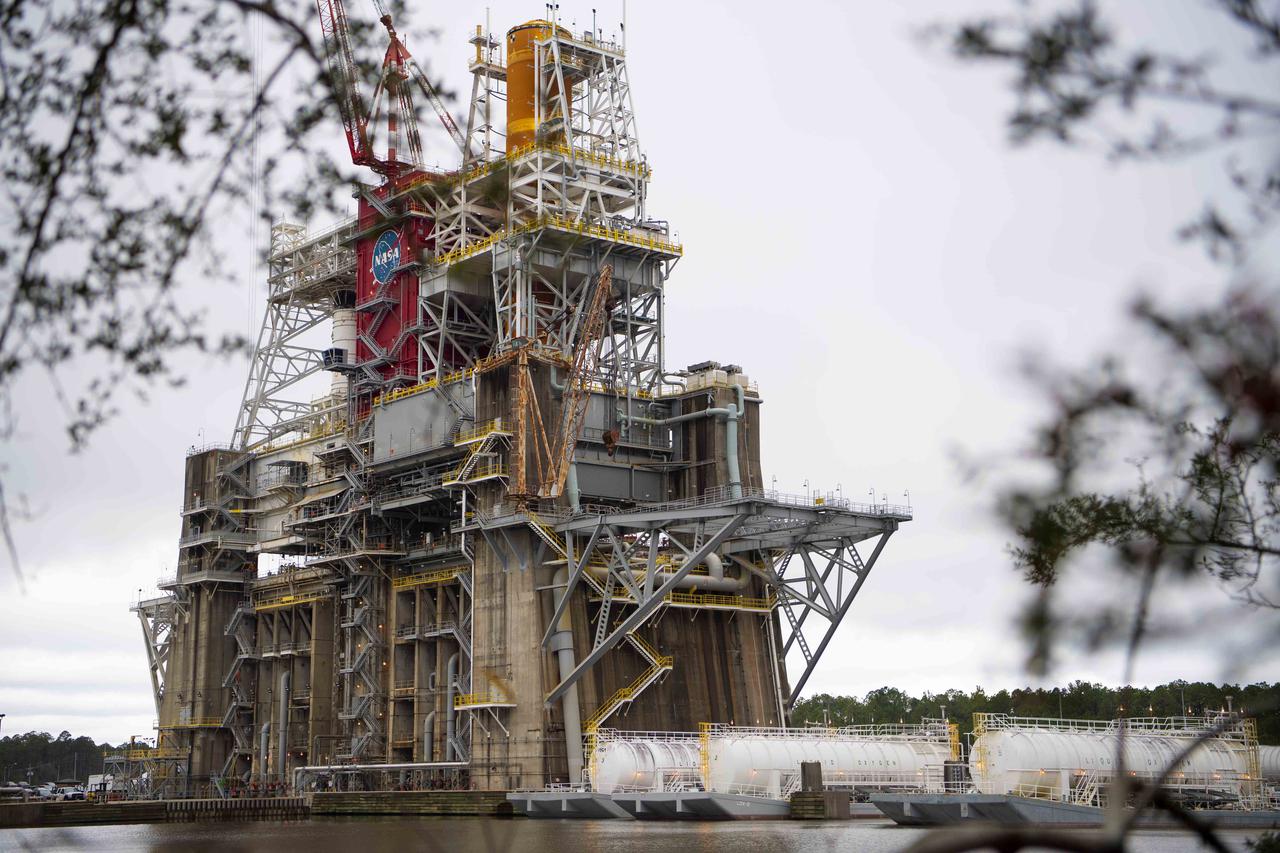 Barges are docked at the B-2 Test Stand at Stennis Space Center near Bay St. Louis, Mississippi, during preparations for a wet dress rehearsal exercise with the core stage of NASA’s Space Launch System rocket. During the wet dress rehearsal, operators will fully load the core stage’s propellant tanks for the first time and countdown just shy of engine ignition. The wet dress rehearsal is the seventh in a series of eight Green Run tests of the core stage’s integrated systems prior to its transport to Kennedy Space Center and launch on the Artemis I mission.