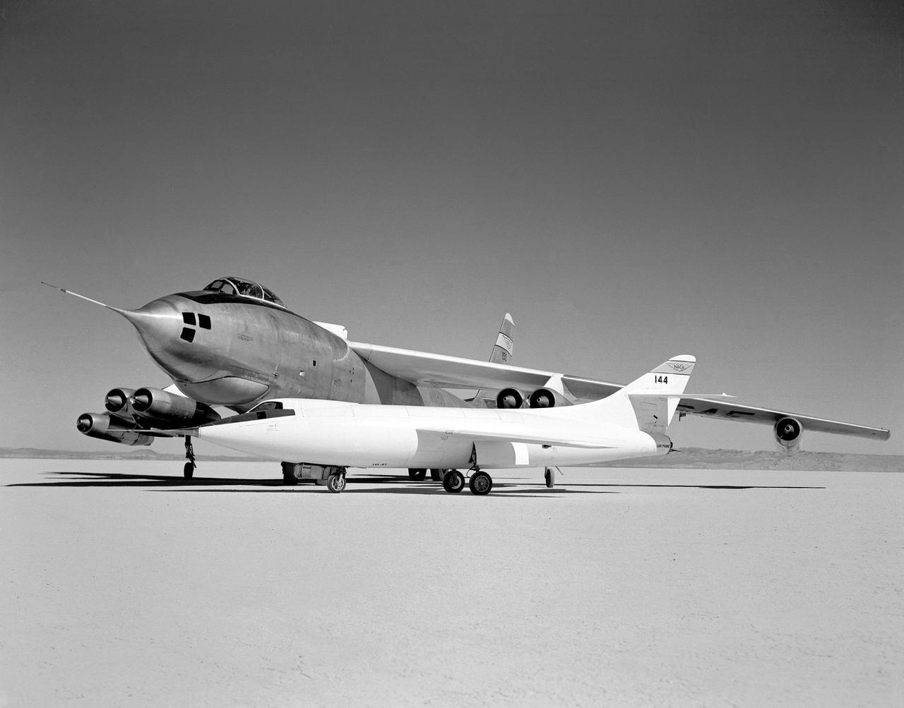 In 1954 this photo of two swept wing airplanes was taken on the ramp of NACA High-Speed Flight Research Station. The Douglas D-558-ll is a research aircraft while the Boeing B-47A Stratojet is a production bomber and very different in size. Both contributed to the studies for swept back wing research.