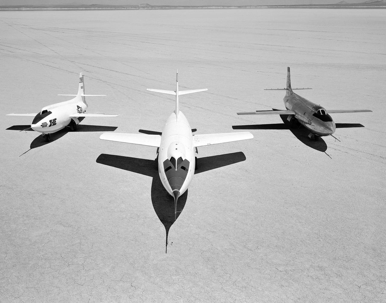 Early NACA research aircraft on the lakebed at the High Speed Research Station in 1955: Left to right: X-1E, D-558-II, X-1B