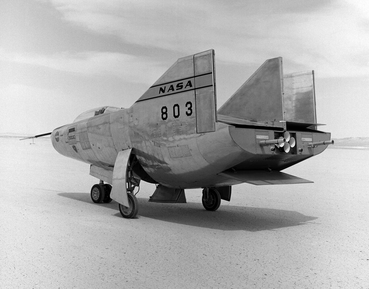 The M2-F3 Lifting Body is seen here on the lakebed next to the NASA Flight Research Center (later the Dryden Flight Research Center), Edwards, California. Redesigned and rebuilt from the M2-F2, the M2-F3 featured as its most visible change a center fin for greater stability. While the M2-F3 was still demanding to fly, the center fin eliminated the high risk of pilot induced oscillation (PIO) that was characteristic of the M2-F2.