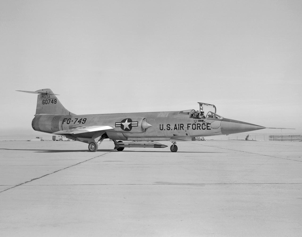 JF-104A (Serial #56-0749) on the ramp at the NASA Flight Research Center (now the Dryden Flight Research Center) at Edwards AFB. The aircraft is shown with the Air Launched Sounding Rocket (ALSOR) attached to the underside. NASA test pilot Milton O. Thompson ejected from this aircraft on 20 December 1962, after an asymmetrical flap condition made the jet uncontrollable.