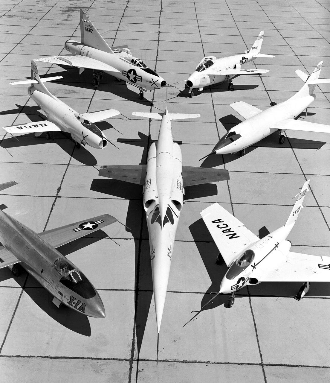 X-3 (center), and clockwise from left: X-1A, D-558-I, XF-92A, X-5, D-558-II, and X-4.