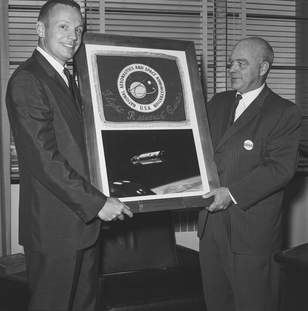 NASA image: Armstrong Presents Lunar Flag to NASA Flight Center Director