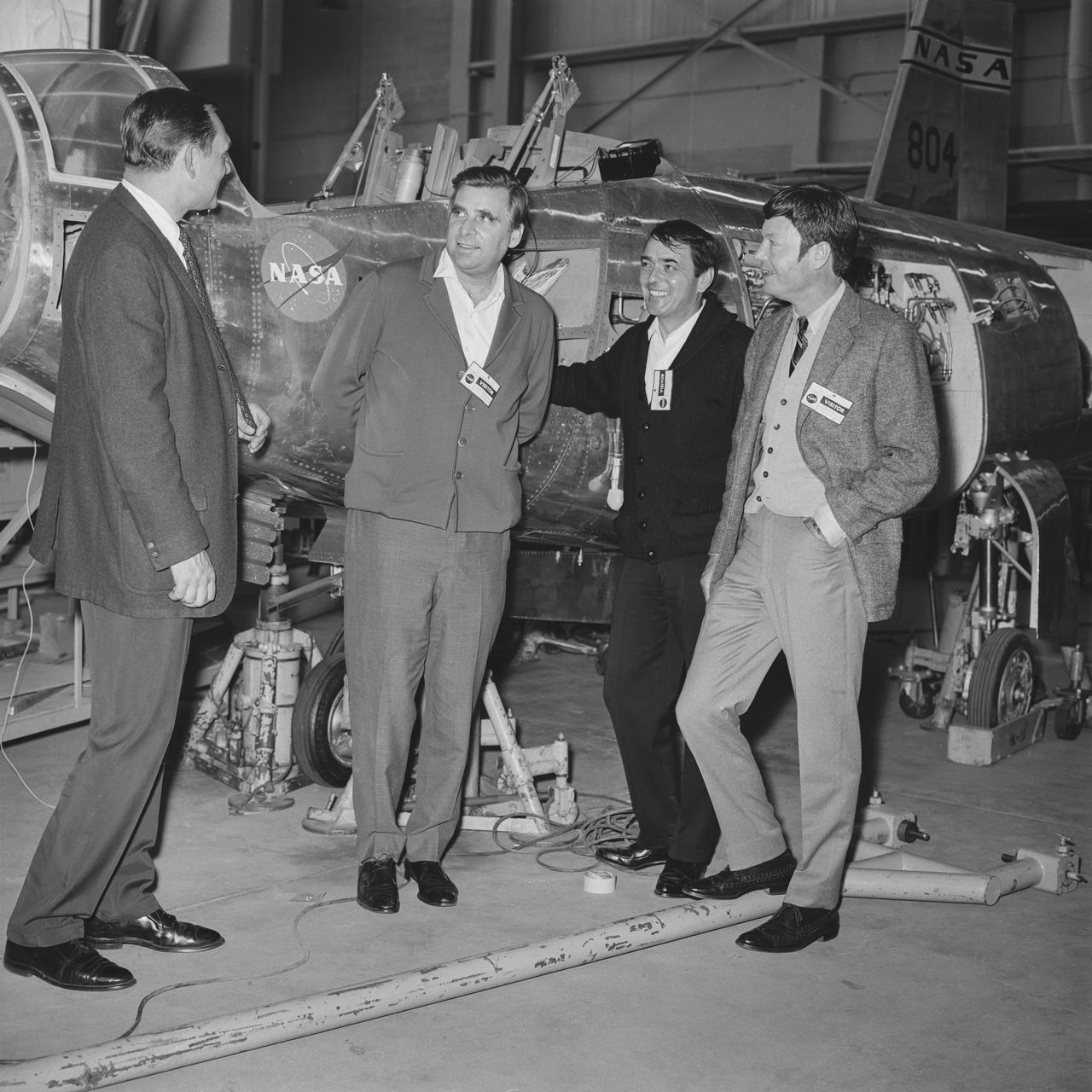 The 1960s Star Trek television series cast members Chief Engineer Montgomery â€˜Scottyâ€™ Scott played by James Doohan andÂ Chief Medical Officer Leonard â€˜Bonesâ€™ McCoyÂ played byÂ DeForest KelleyÂ and the showâ€™sÂ creator Gene RoddenberryÂ receive briefing on NASA Dryden Flight Research Center, now Armstrong, in front ofÂ HL-10