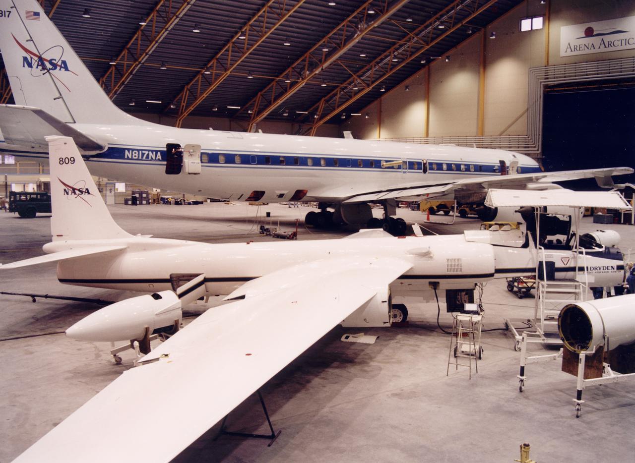 NASA ER-2 # 809 and its DC-8 shown in Arena Arctica before the SAGE III Ozone Loss and Validation Experiment (SOLVE). The two airborne science platforms were based north of the Arctic Circle in Kiruna, Sweden, during the winter of 2000 to study ozone depletion as part of SOLVE. A large hangar built especially for research, "Arena Arctica" housed the instrumented aircraft and the scientists. Scientists have observed unusually low levels of ozone over the Arctic during recent winters, raising concerns that ozone depletion there could become more widespread as in the Antarctic ozone hole. The NASA-sponsored international mission took place between November 1999 and March 2000 and was divided into three phases. The DC-8 was involved in all three phases returning to Dryden between each phase. The ER-2 flew sample collection flights between January and March, remaining in Sweden from Jan. 9 through March 16. "The collaborative campaign will provide an immense new body of information about the Arctic stratosphere," said program scientist Dr. Michael Kurylo, NASA Headquarters. "Our understanding of the Earth's ozone will be greatly enhanced by this research." 