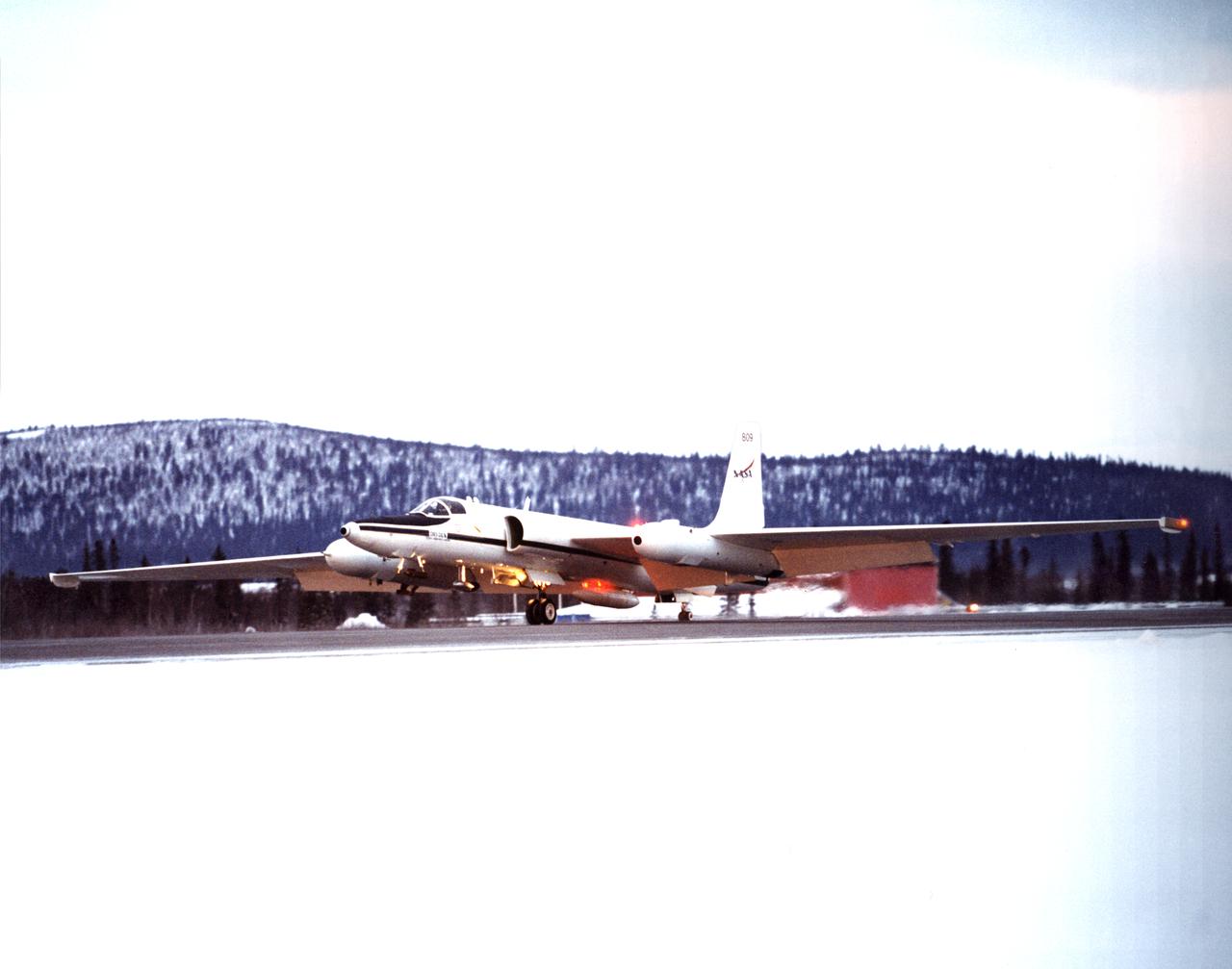 ER-2s bearing tail numbers 806 and 809 are used as airborne science platforms by NASA's Dryden Flight Research Center. The aircraft are platforms for a variety of high-altitude science missions flown over various parts of the world. They are also used for earth science and atmospheric sensor research and development, satellite calibration and data validation. The ER-2s are capable of carrying a maximum payload of 2,600 pounds of experiments in a nose bay, the main equipment bay behind the cockpit, two wing-mounted superpods and small underbody and trailing edges. Most ER-2 missions last about six hours with ranges of about 2,200 nautical miles. The aircraft typically fly at altitudes above 65,000 feet. On November 19, 1998, an ER-2 set a world record for medium weight aircraft reaching an altitude of 68,700 feet. The aircraft is 63 feet long, with a wingspan of 104 feet. The top of the vertical tail is 16 feet above ground when the aircraft is on the bicycle-type landing gear. Cruising speeds are 410 knots, or 467 miles per hour, at altitude. A single General Electric F-118 turbofan engine rated at 17,000 pounds thrust powers the ER-2.