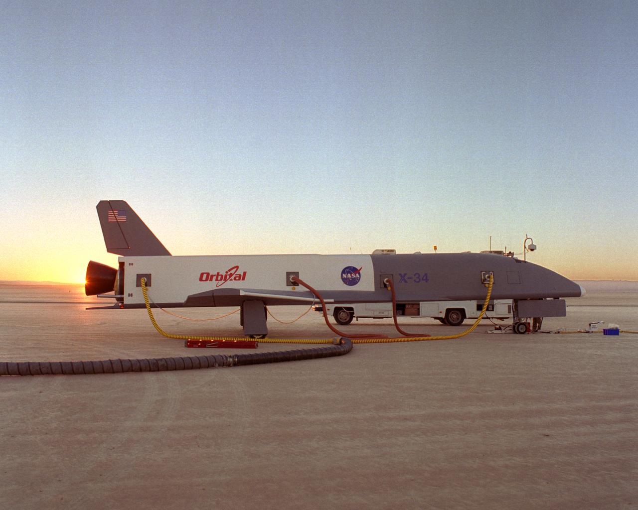 Following initial captive flight tests last year at NASA's Dryden Flight Research Center, Edwards Air Force Base, California, the X-34 technology demonstrator began a new series of tests last week in which it is being towed behind a semi-truck and released to coast on the Edwards dry lakebed. On July 20, 2000, it was towed and released twice at speeds of five and 10 miles per hour. On July 24, 2000, it was towed and released twice at 10 and 30 miles per hour. Twelve tests are planned during which the X-34 will be towed for distances up to 10,000 feet and released at speeds up to 80 miles per hour. The test series is expected to last at least six weeks.