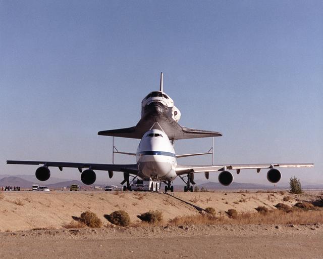 NASA image: STS-92 - Towing of Shuttle Discovery and Boeing 747 Shuttle Carrier Aircraft (SCA)