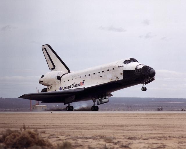 NASA image: Space Shuttle Atlantis landing at 12:33 p.m. February 20, 2001, on the runway at Edwards Air Force Base, California, where NASA's Dryden Flight Research Center is located