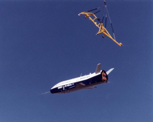The X-40A immediately after release from its harness suspended from a helicopter 15,000 feet above NASA's Dryden Flight Research Center at Edwards Air Force Base, California, on March 14, 2001