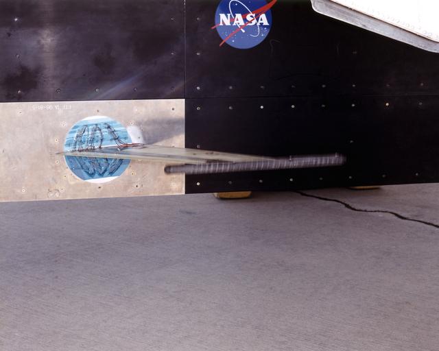 NASA image: The Aerostructures Test Wing (ATW) experiment, which consisted of an 18-inch carbon fiber test wing with surface-mounted piezoelectric strain actuators, undergoing ground testing prior to flight on Dryden's F-15B Research Testbed aircraft