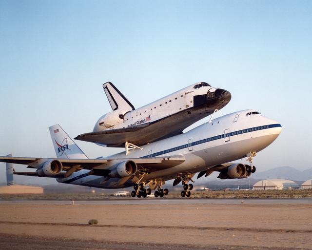 NASA image: NASA's modified Boeing 747 Shuttle Carrier Aircraft with the Space Shuttle Endeavour on top lifts off to begin its ferry flight back to the Kennedy Space Center in Florida