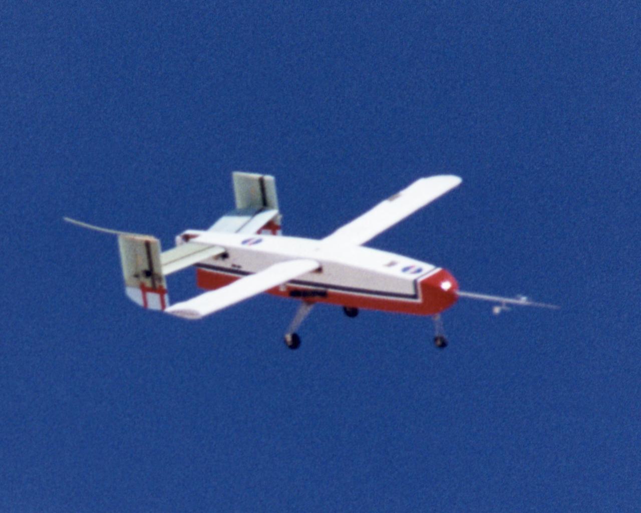Wing Deployment Sequence #3: The deployable, inflatable wing technology demonstrator experiment aircraft's wings fully deployed during flight following separation from its carrier aircraft during a flight conducted by the NASA Dryden Flight Research Center, Edwards, Californiaornia. The inflatable wing project represented a basic flight research effort by Dryden personnel. Three successful flights of the I2000 inflatable wing aircraft occurred. During the flights, the team air-launched the radio-controlled (R/C) I2000 from an R/C utility airplane at an altitude of 800-1000 feet.  As the I2000 separated from the carrier aircraft, its inflatable wings "popped-out," deploying rapidly via an on-board nitrogen bottle. The aircraft remained stable as it transitioned from wingless to winged flight. The unpowered I2000 glided down to a smooth landing under complete control.
