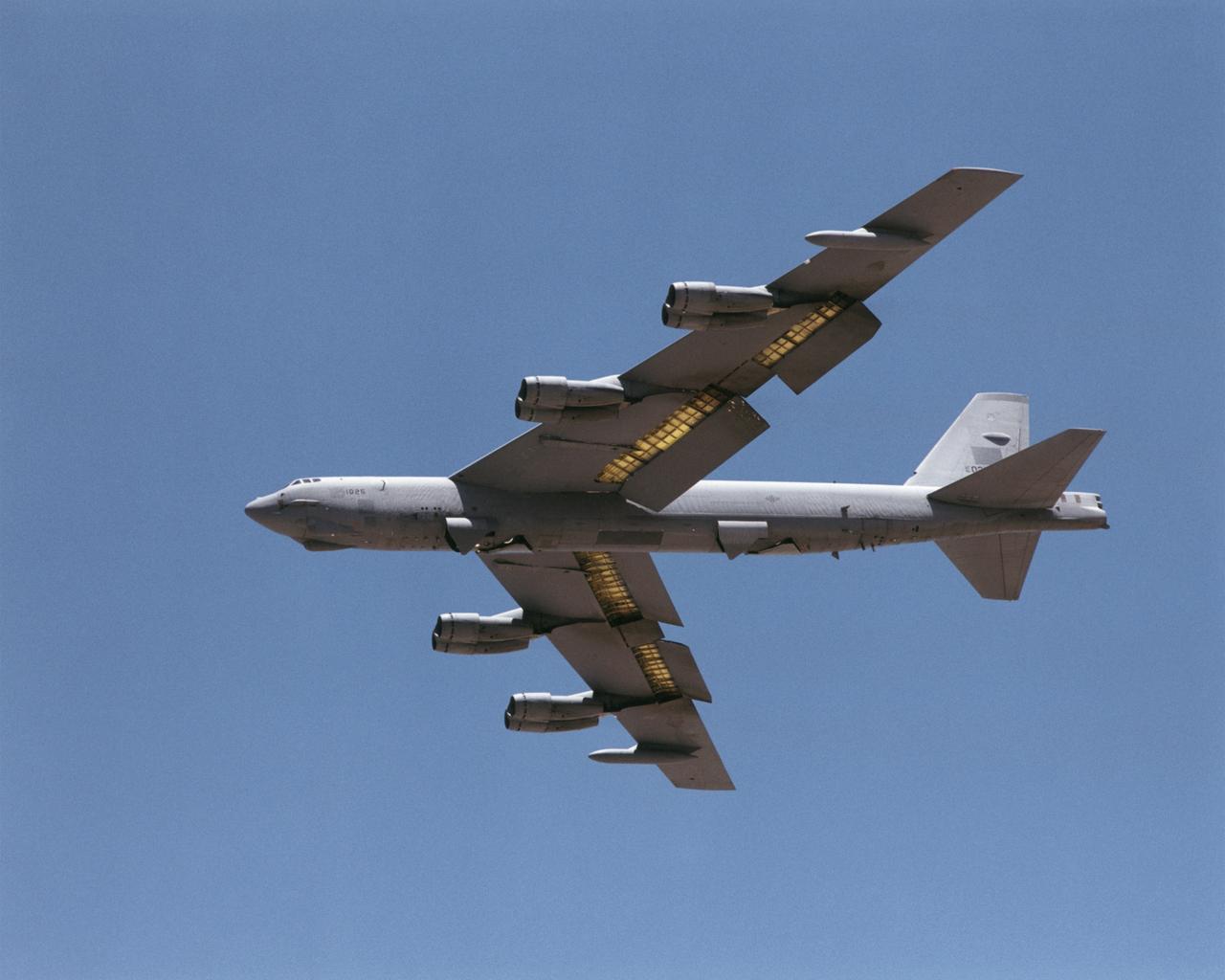 A B-52H, on loan to NASA's Dryden Flight Research Center, makes a pass down the runway prior to landing at Edwards Air Force Base, California.