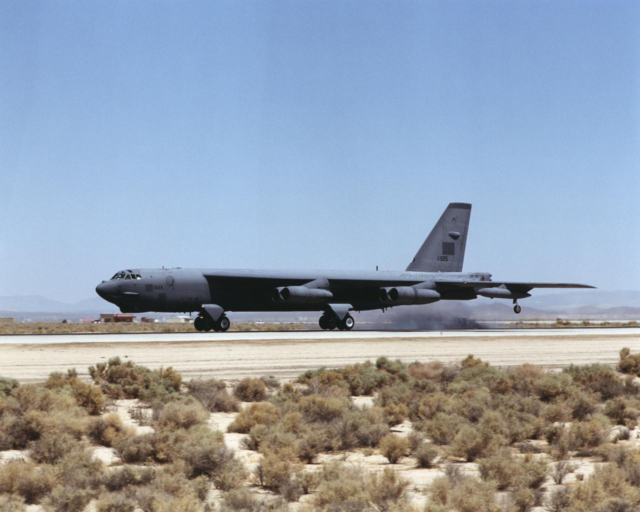 A B-52 "H" model, on loan to NASA Dryden from the U.S. Air Force, touches down at Edwards Air Force Base, California, July 30, 2001.