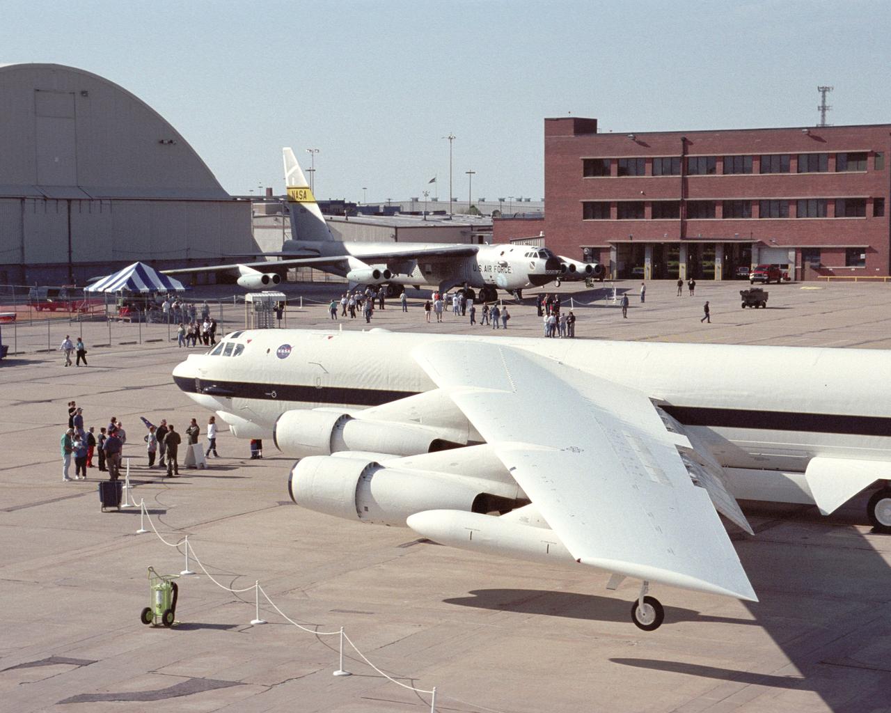 NASA's new white B-52H, shared ramp space with the veteran NASA B-52B mother ship in Wichita, Kansas, April 12, 2002 during the 50th anniversary of the B-52 aircraft.