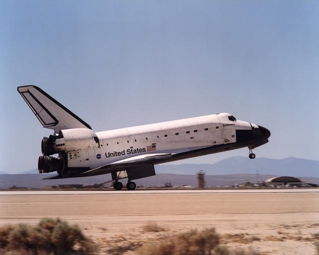 Space Shuttle Endeavour touches down on the runway at Edwards Air Force Base, California to conclude International Space Station construction and supply mission STS-111