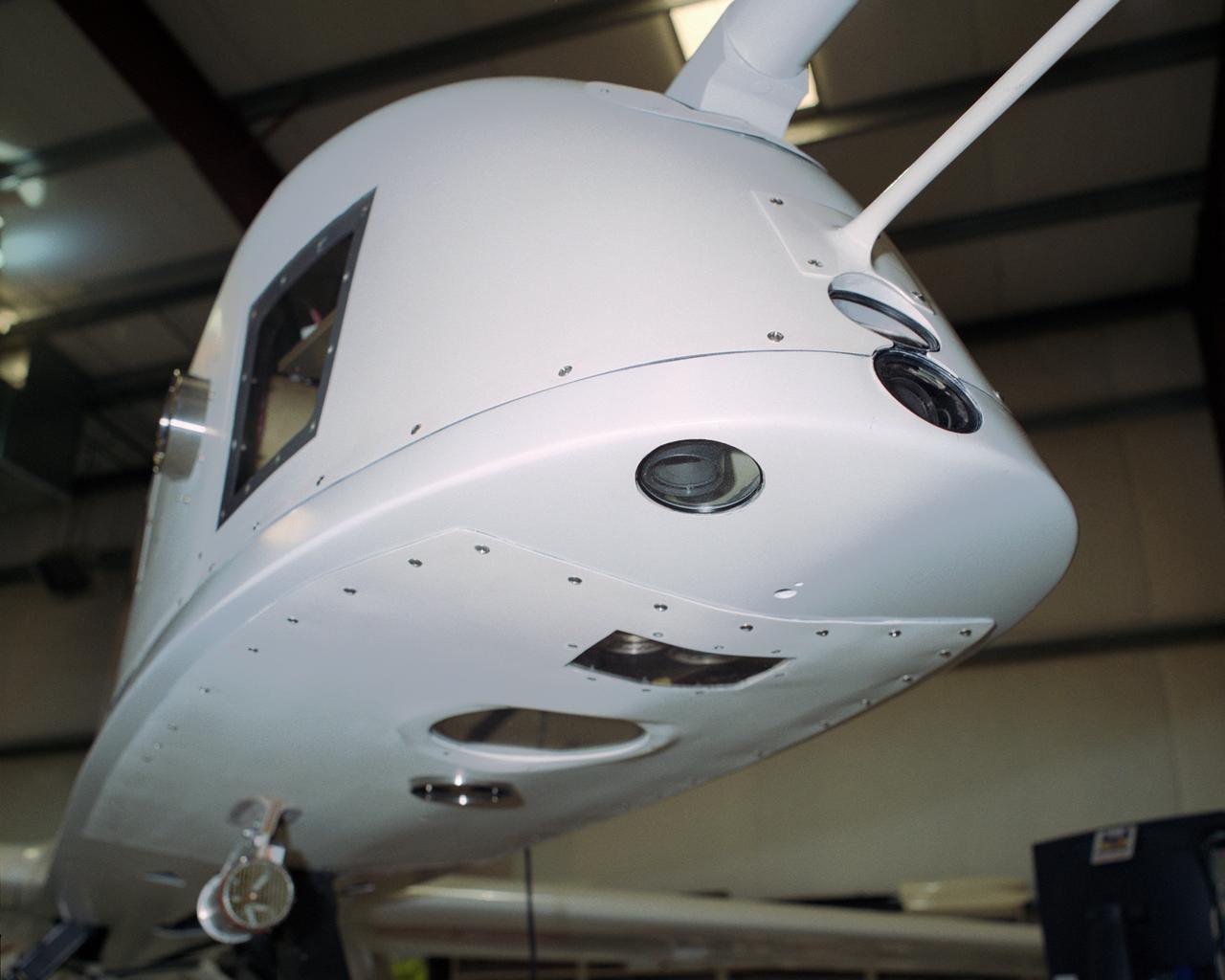 Looking ever so much like an alien spacecraft, the Altus II remotely piloted aircraft shows off some of the instruments and camera lenses mounted in its nose for a lightning study over Florida flown during the summer of 2002.