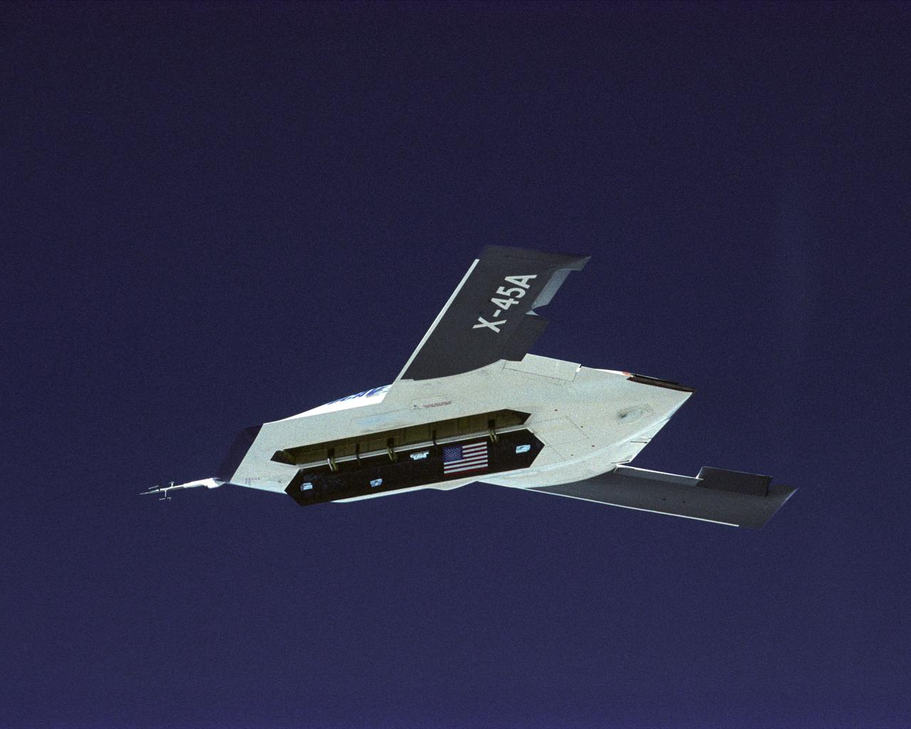 The DARPA/U.S. Air Force X-45A Unmanned Combat Air Vehicle (UCAV) system demonstration program completed the first phase of demonstrations, known as Block I, on Feb. 28, 2003. The final Block I activities included two flights at Dryden, during which safe operation of the weapons bay door was verified at 35,000 feet and speeds of Mach 0.75, the maximum planned altitude and speed for the two X-45A demonstrator vehicles.