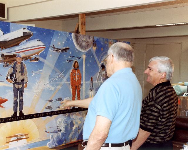 NASA image: Bob Mccall and NASA Dryden Center Director Kevin Petersen in the artist's studio in Paradise Valley, Arizona.